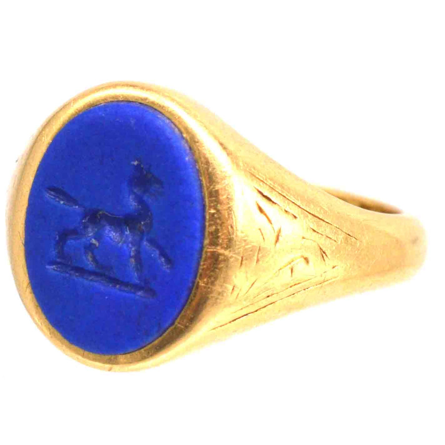 1960s 18ct gold signet ring with lapis lazuli intaglio of a wolf or dog, showcasing classic craftsmanship.