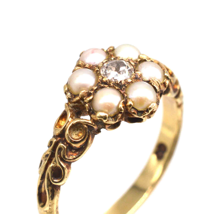 Late Victorian 9ct gold ring with split pearls and old mine cut diamond cluster, dating back to the 1860s.