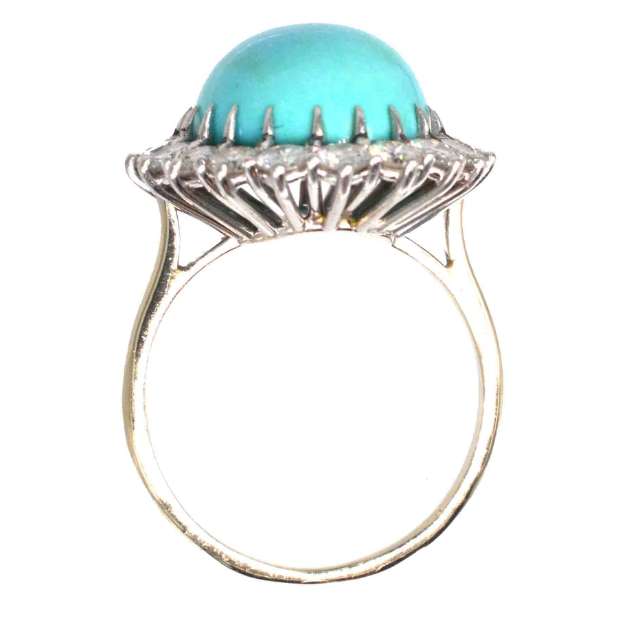 Vintage turquoise and diamond cluster cocktail ring in 18ct gold and platinum, showcasing a stunning oval turquoise stone.