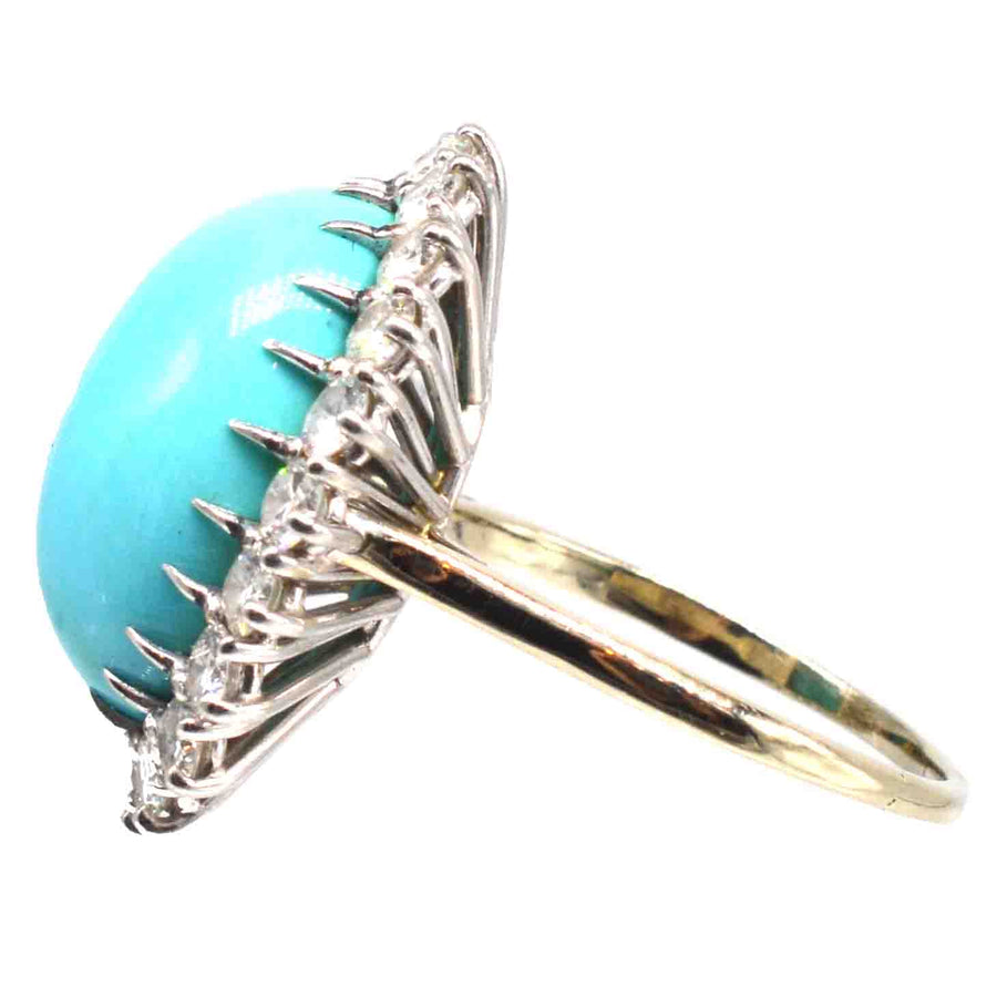 Vintage French turquoise and diamond cluster cocktail ring in 18ct gold and platinum, showcasing a large oval turquoise stone.